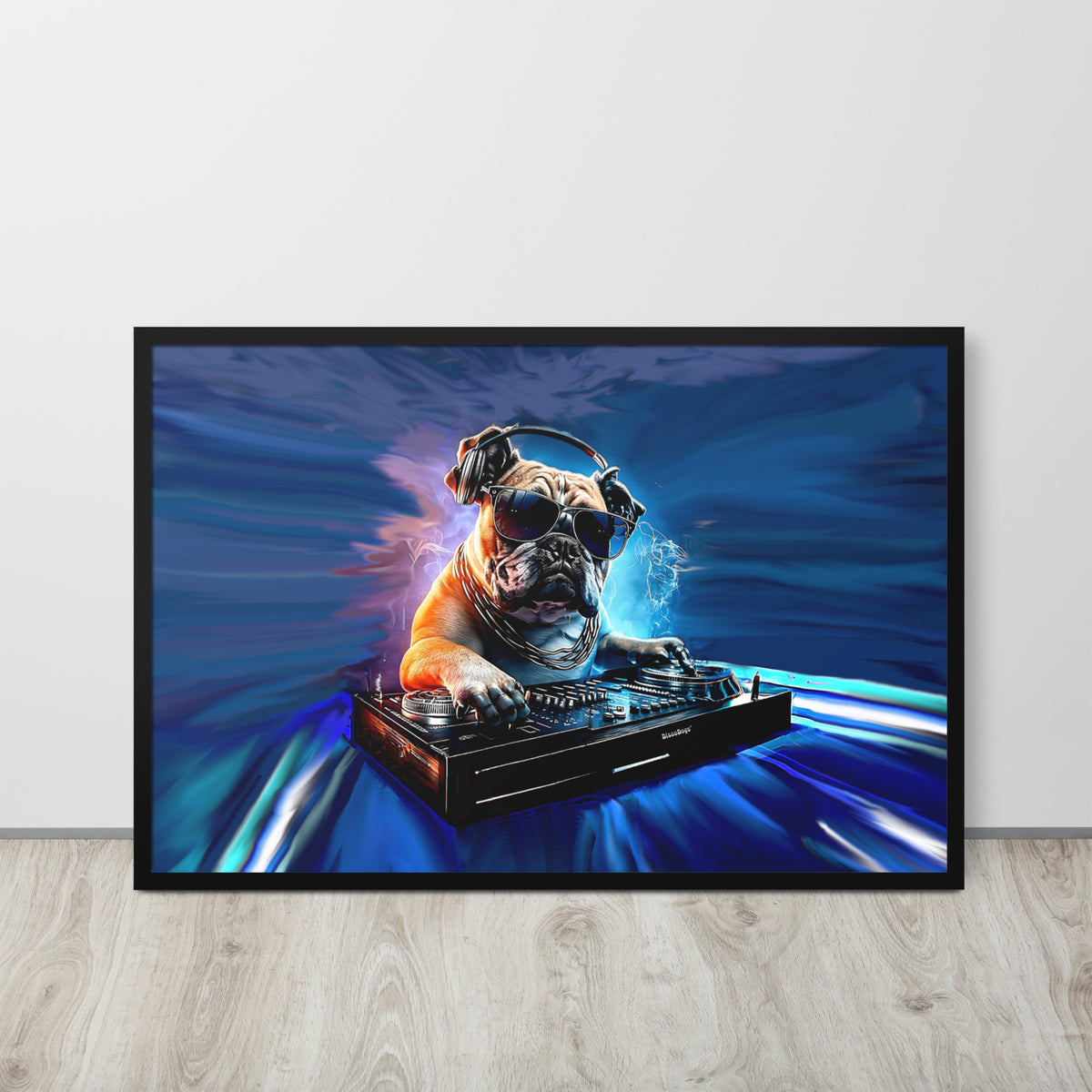 A framed dog wall art print featuring a stylized bulldog wearing sunglasses and headphones, DJing on a turntable against a blue abstract background, displayed on a light wood floor against a white wall.