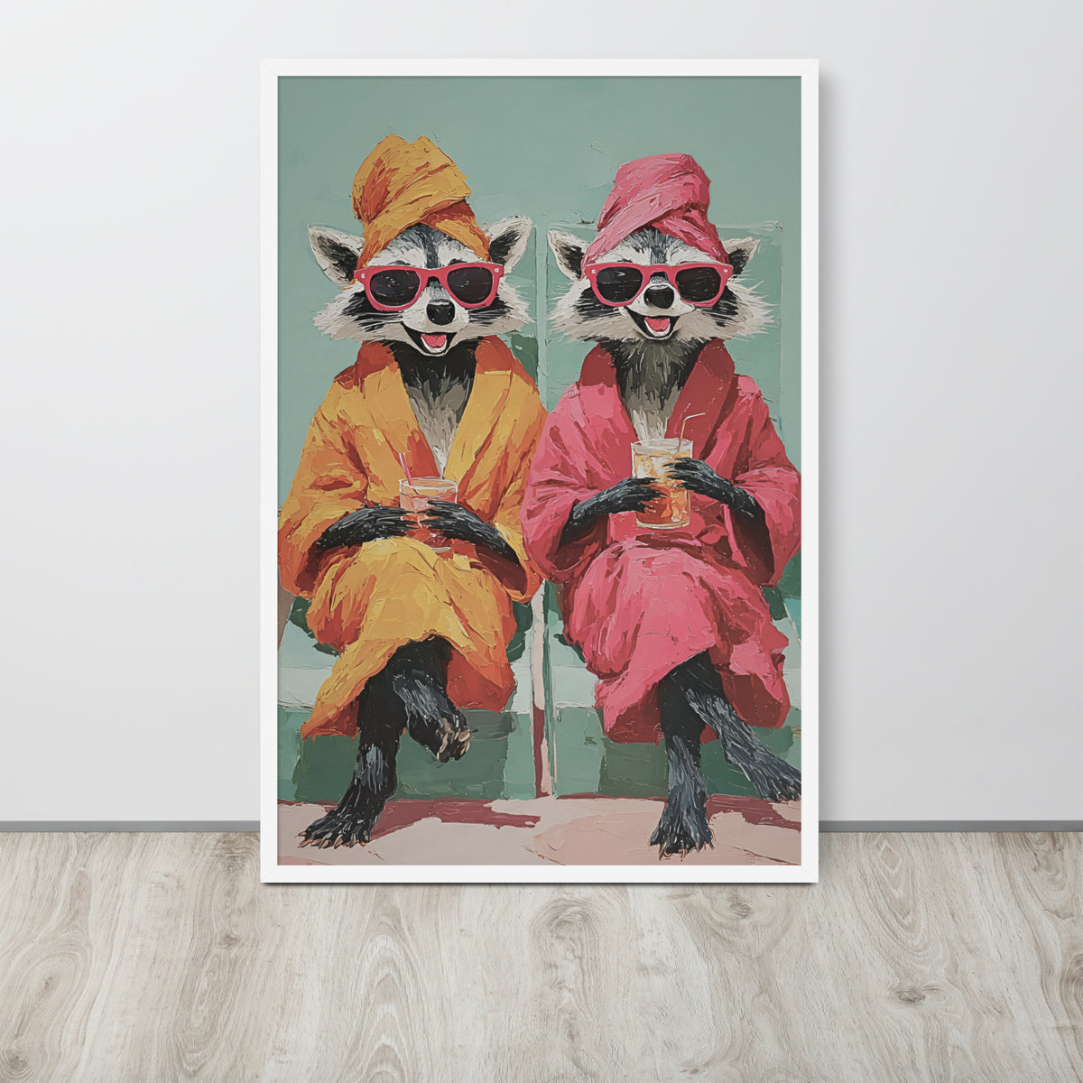 Raccoon lover wall art print. The print shows two raccoons wearing pink sunglasses and robes, one in orange and one in pink, holding drinks.
