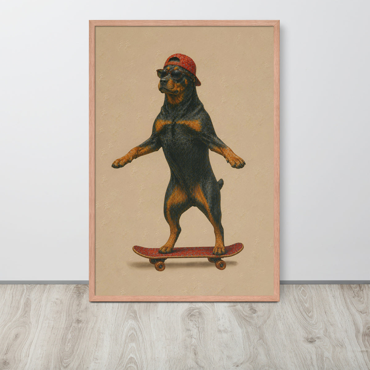 Rottweiler nursery wall art print featuring a vintage-style illustration of a Rottweiler dog balancing on a skateboard while wearing a red cap, displayed against a light gray wall on a light wood floor.