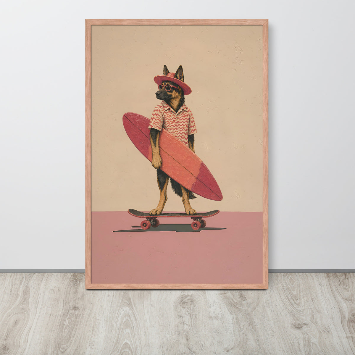 Vintage German shepherd wall art print featuring a German Shepherd dog dressed as a surfer, holding a pink surfboard on a skateboard against a beige and dusty pink background, leaning against a white wall on a light wood floor.