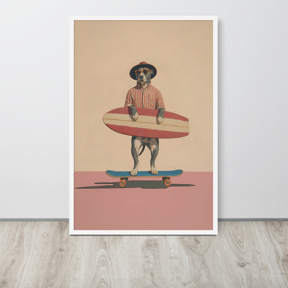 Retro pitbull dog wall art print leaning against a white wall on a light wood floor. The artwork shows a dog standing on a skateboard, holding a red and cream striped surfboard, against a beige and pink background.