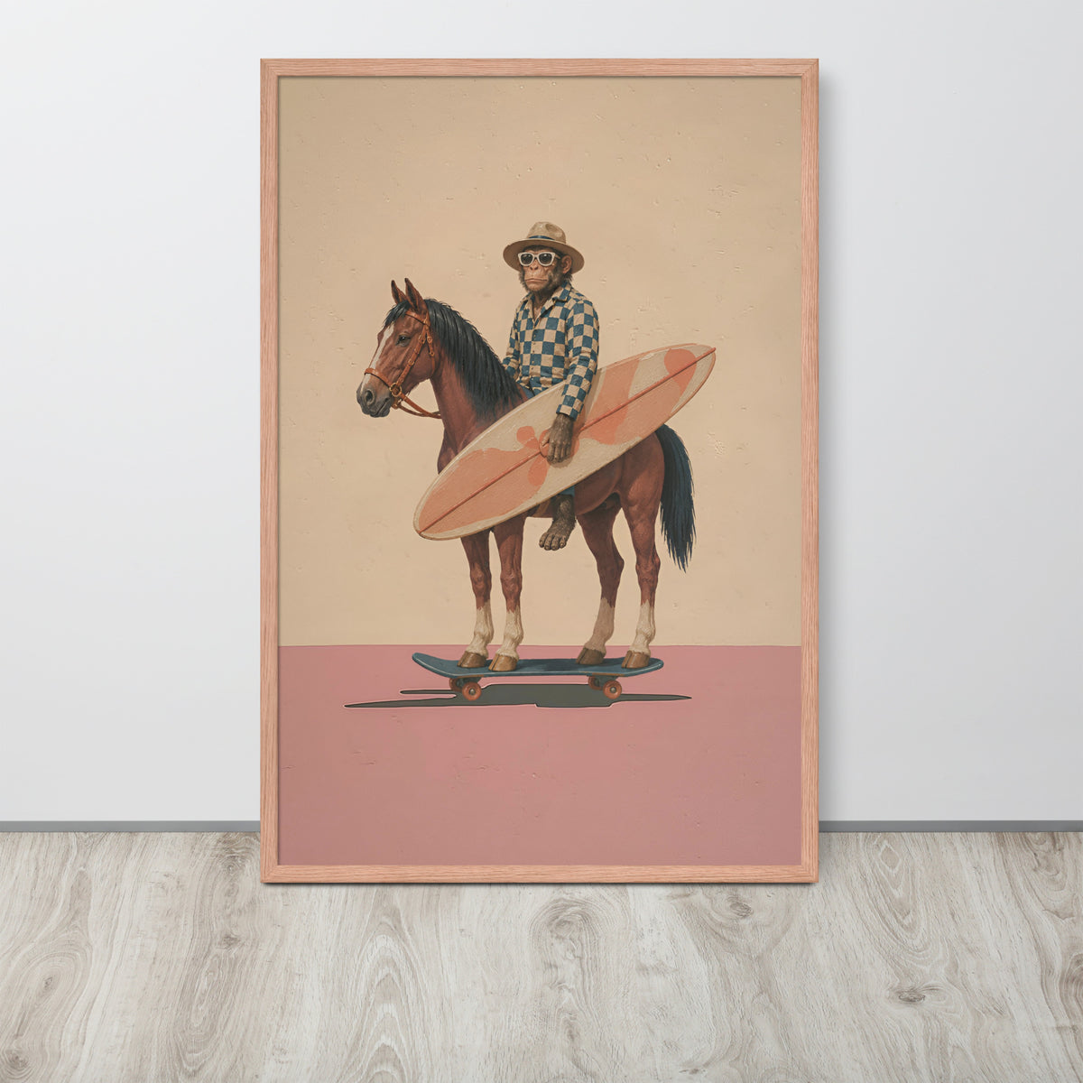 Funny surreal wall art print featuring a whimsical illustration of a monkey in a hat riding a brown horse while holding a pink surfboard on a skateboard, displayed against a light gray wall on a wood floor.