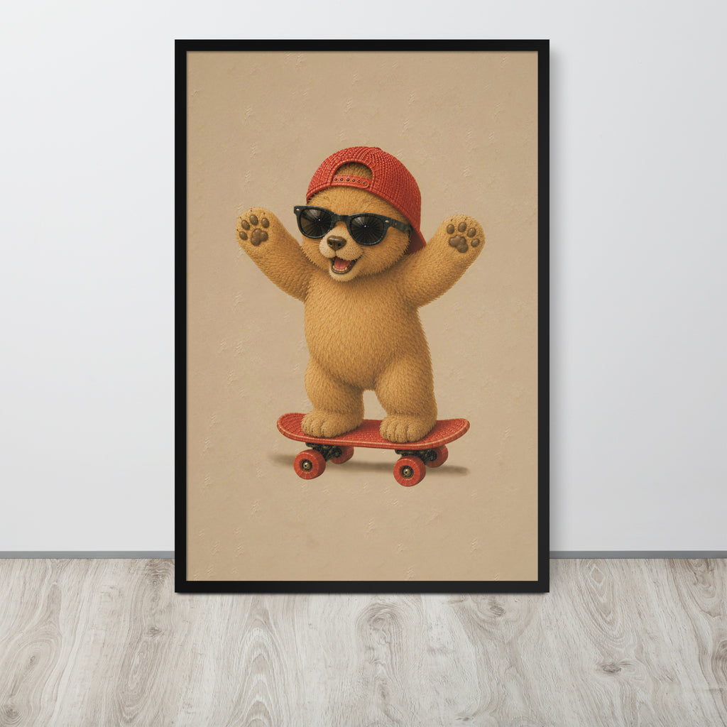 A framed teddy bear nursery wall art print featuring a cute cartoon teddy bear wearing a red cap and black sunglasses while riding a red skateboard, displayed against a light gray wall on a light wood floor.