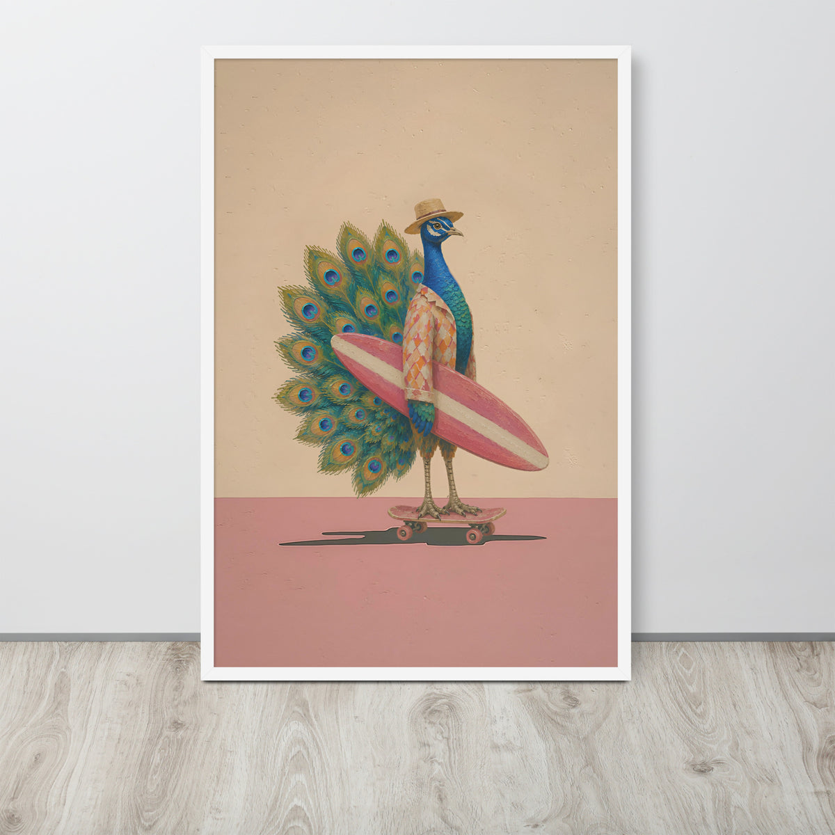 A framed funny peacock wall art poster print featuring a peacock with a fanned tail standing on a skateboard and holding a pink surfboard, displayed against a light gray wall on a wood floor.